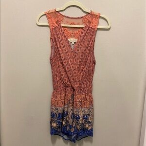 Miss Daisy pink and blue beautiful romper with a V neck and a snap. Size medium